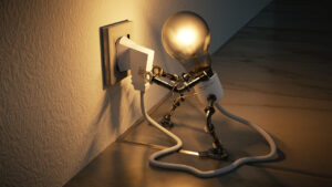 robot lightbulb plugging itself in